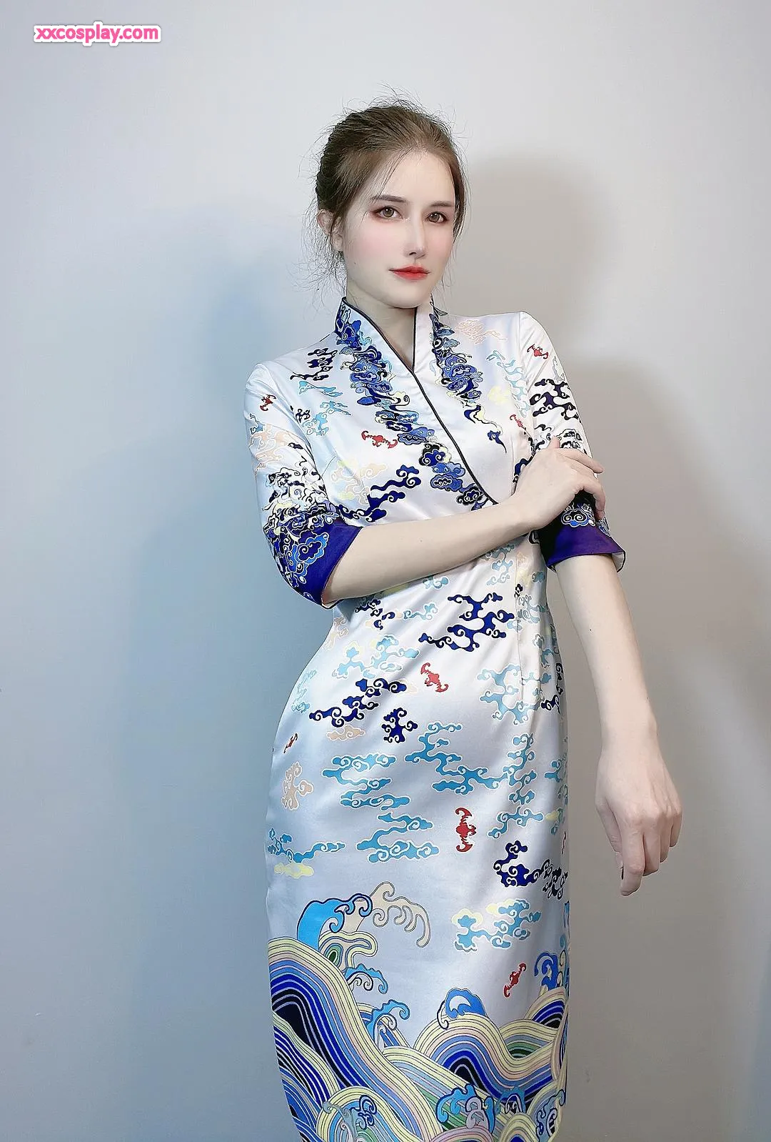 Luba Sui - Pramugari Cheongsam Hainan Airlines